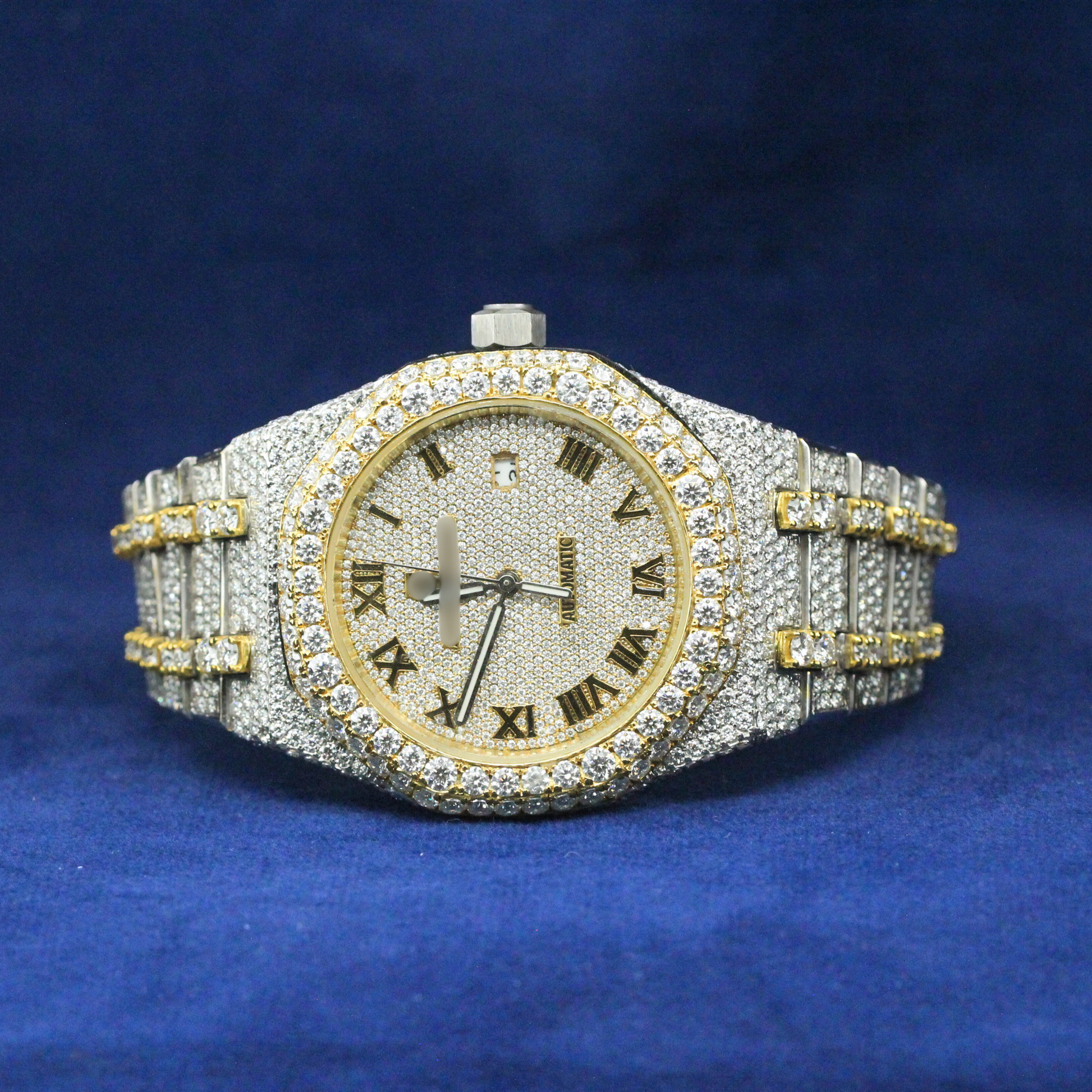 Luxe Roman Blizzard Watch in 925 silver, featuring a fully iced-out Moissanite diamond bezel and Roman numeral luxury dial, crafted for high-end hip-hop watch collectors.