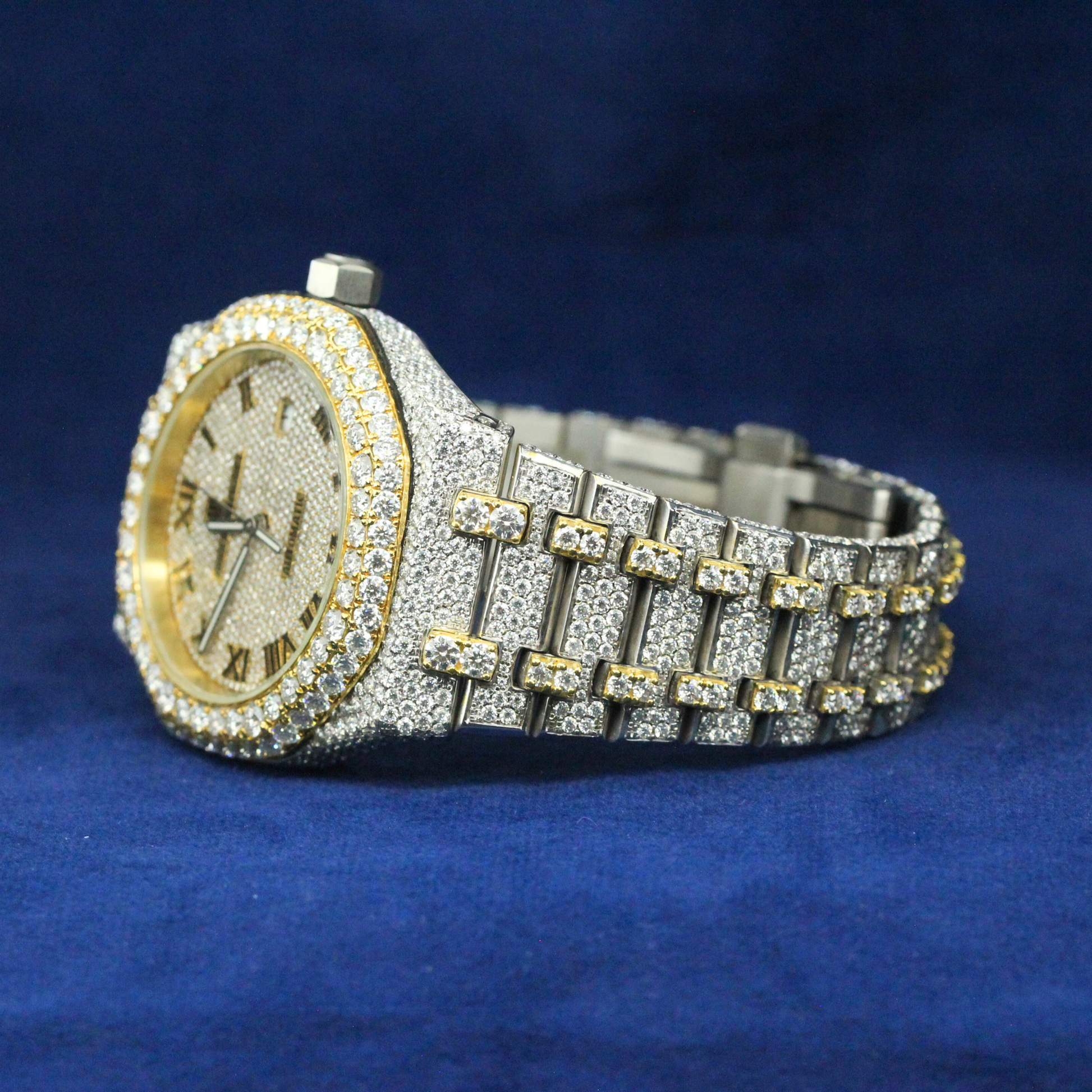 Left-side view of Luxe Roman Blizzard Watch in 925 silver, featuring an elegant fully iced-out Moissanite diamond design with classic Roman numeral detailing.