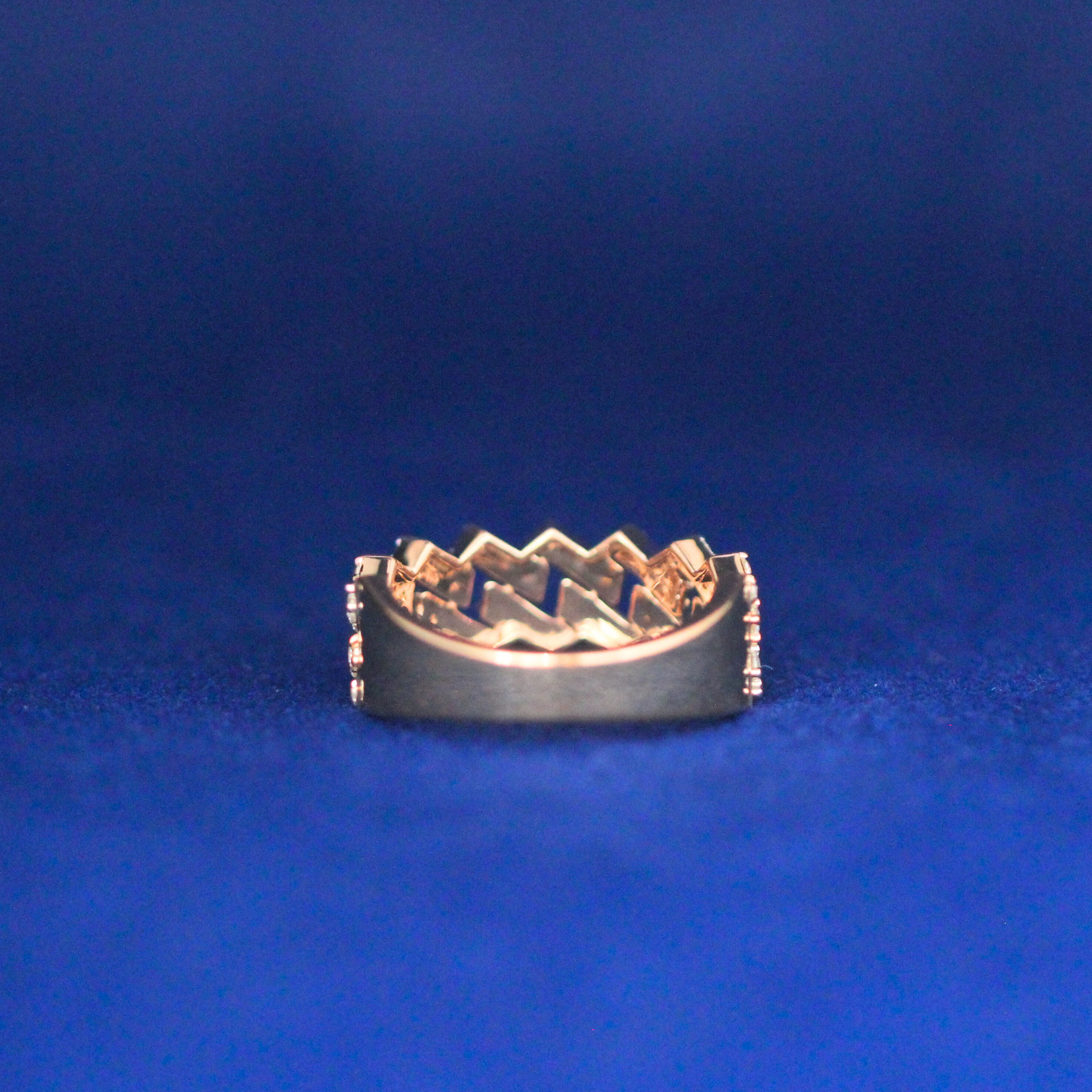 Back view of Cuban gold ring with moissanite detailing, a statement piece in luxury hip hop jewelry.