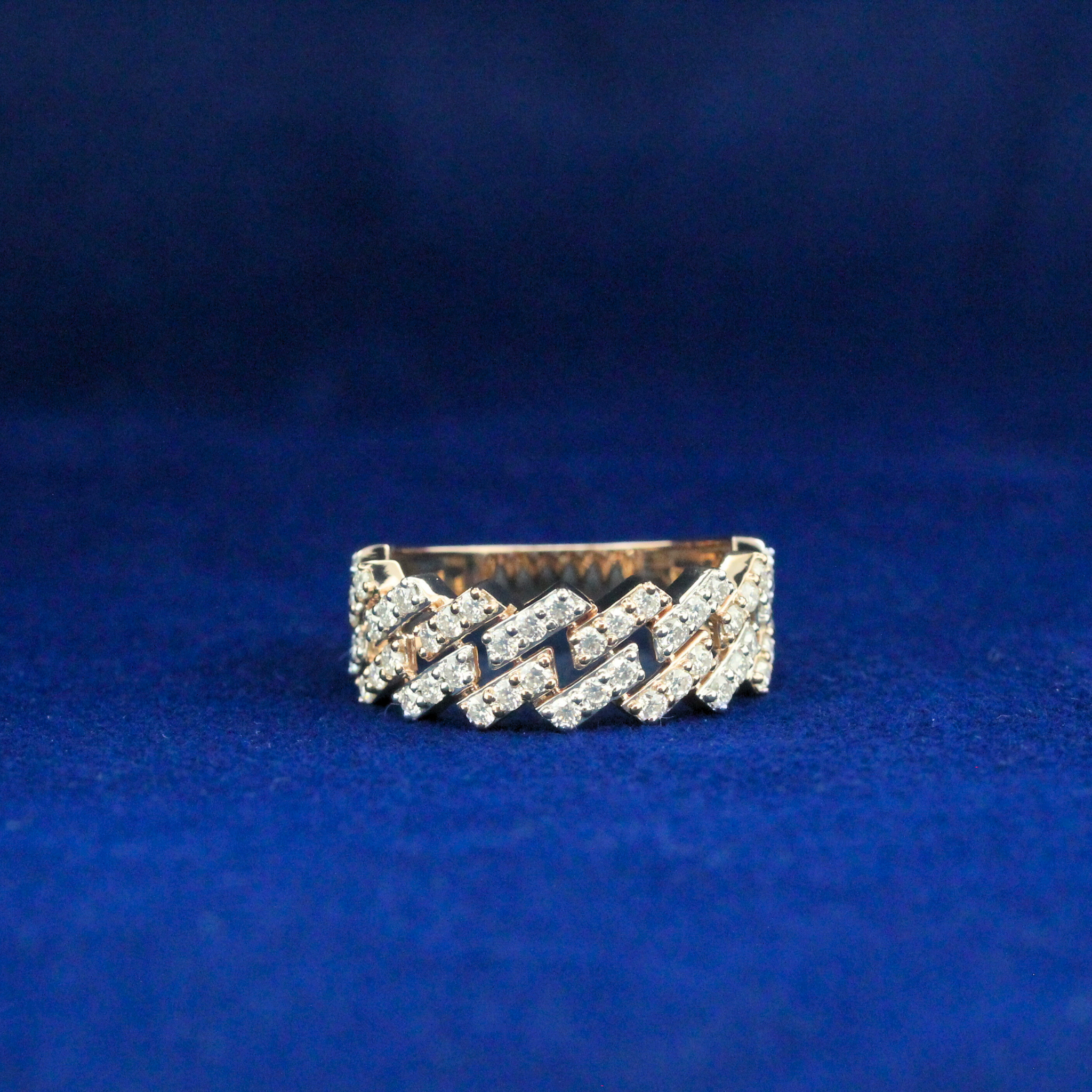 Front view of iced-out Cuban ring in gold metal with moissanite diamonds, bold hip hop jewelry for standout style.

