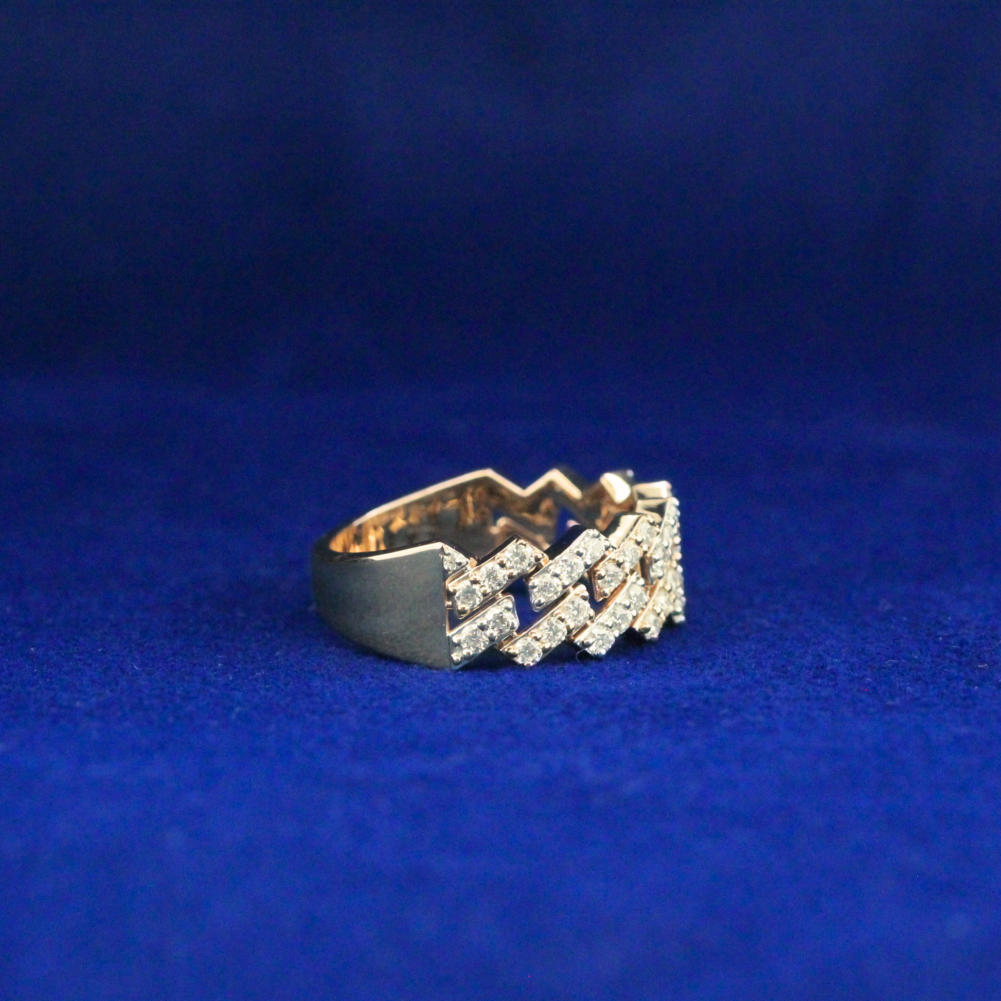 Left view of hip hop style Cuban ring in gold with shining moissanite diamonds, perfect for streetwear bling.

