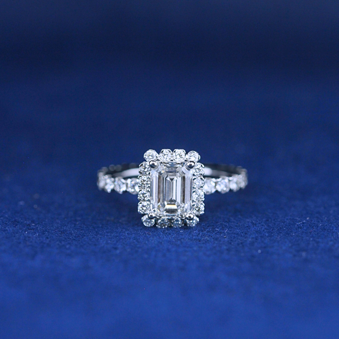 A stunning fine jewelry emerald diamond ring in 925 sterling silver, featuring a classic emerald-cut diamond in an elegant setting.