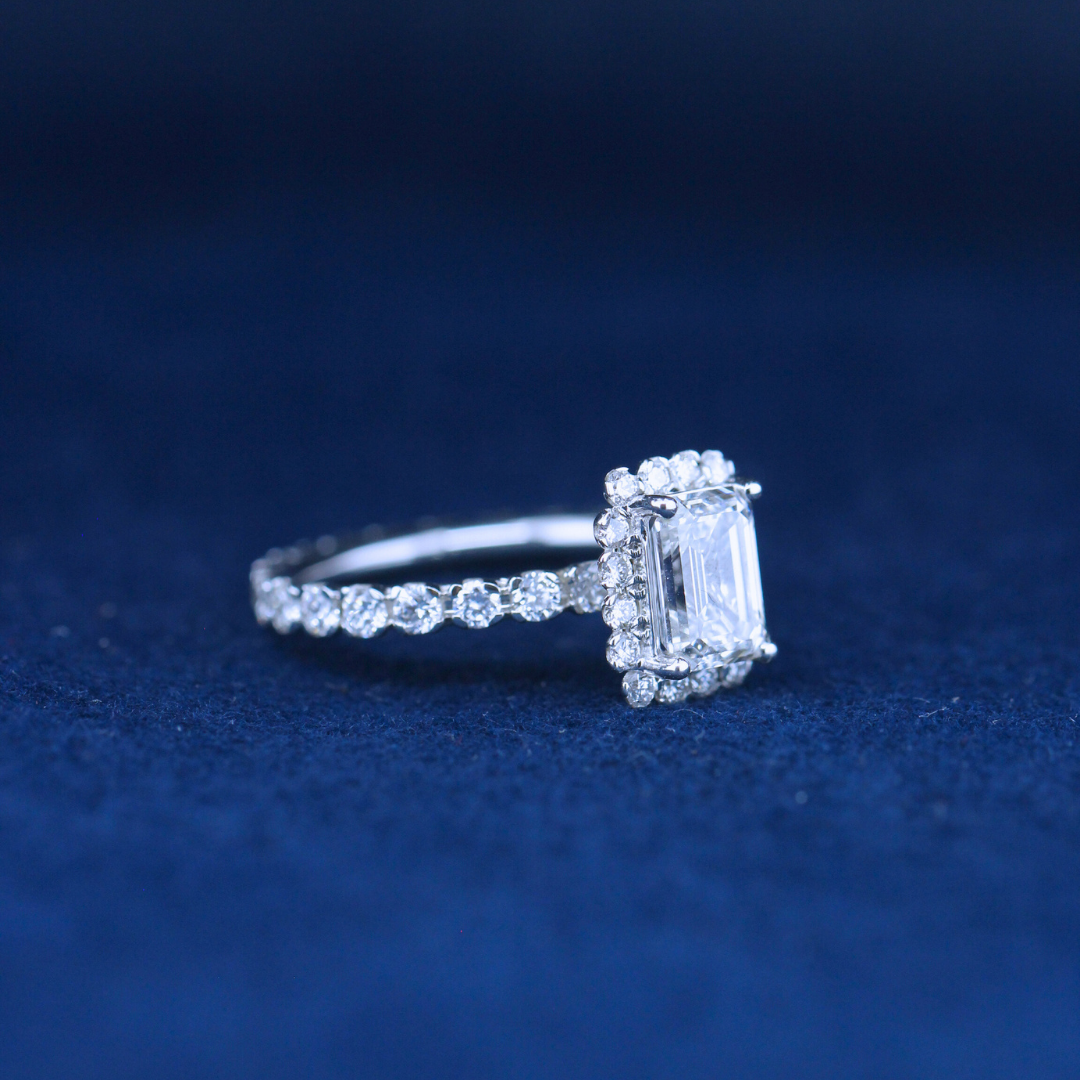 A stunning fine jewelry emerald diamond ring in 925 sterling silver, featuring a classic emerald-cut diamond in an elegant setting.