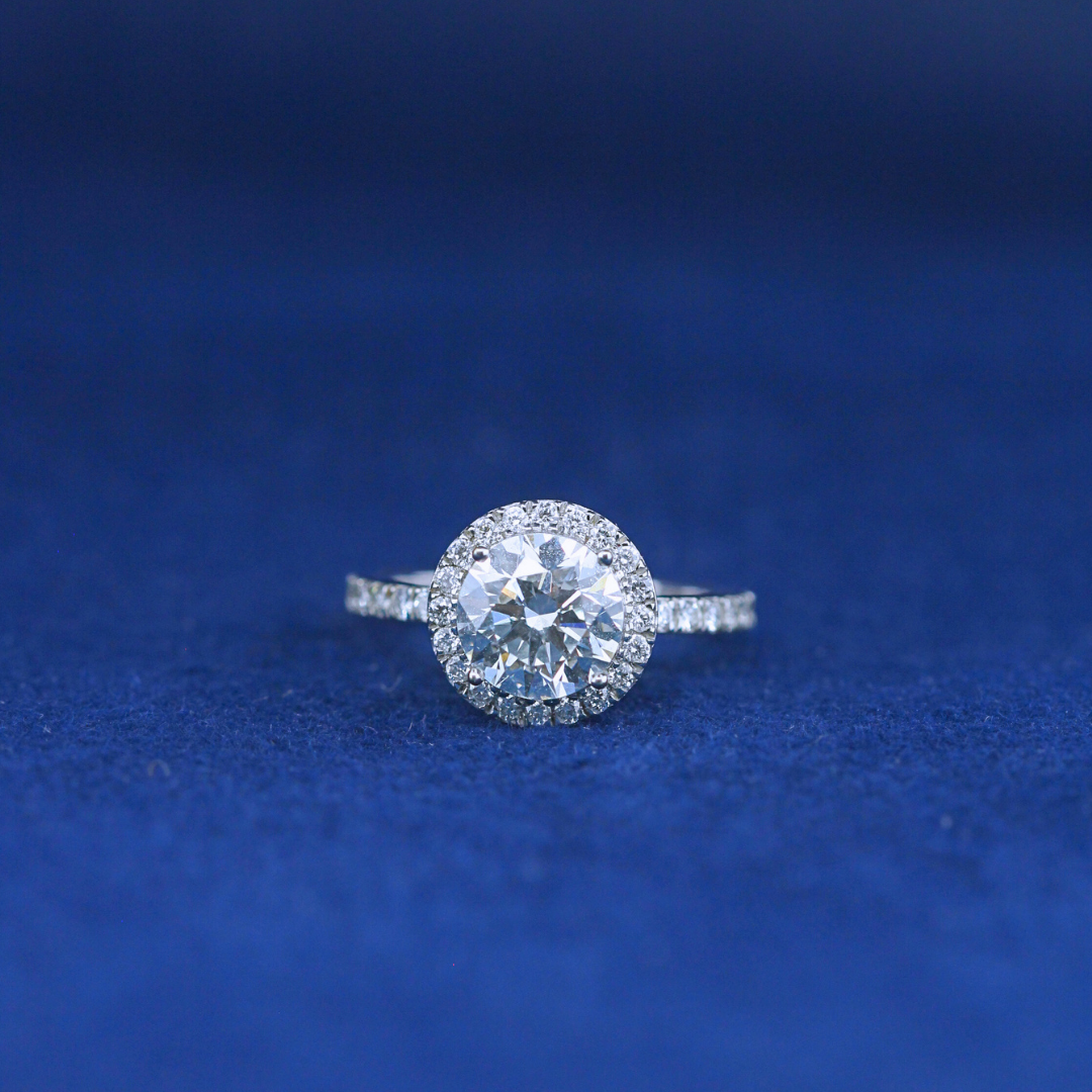 A classic fine jewelry solitaire diamond ring in 925 sterling silver, featuring a single brilliant-cut diamond in an elegant setting.