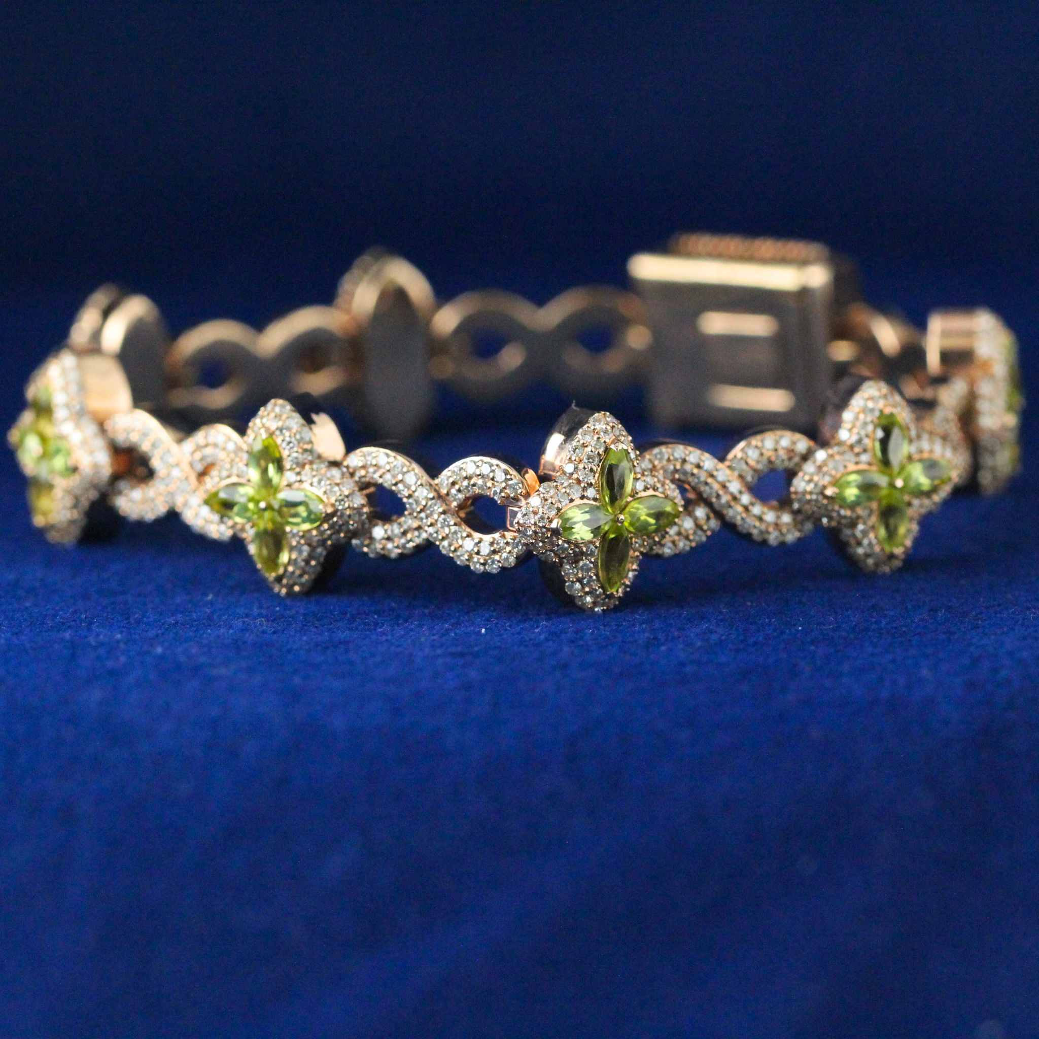 Front view of the floral colored bracelet featuring multicolor gemstones set in 925 silver with moissanite accents, fine jewelry.