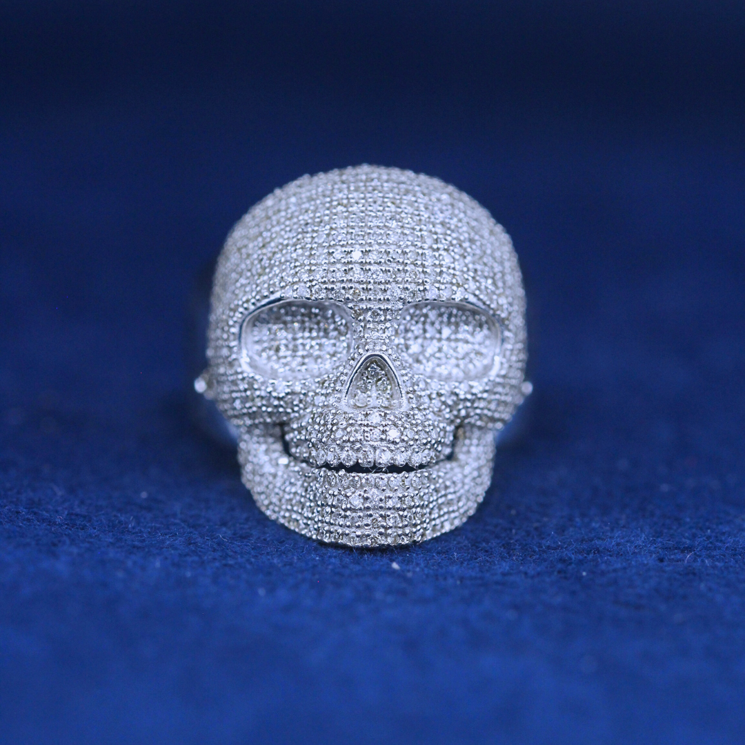 A bold hip-hop jewelry skull ring in 925 sterling silver, featuring an intricate gothic-inspired design with a high-polish finish.