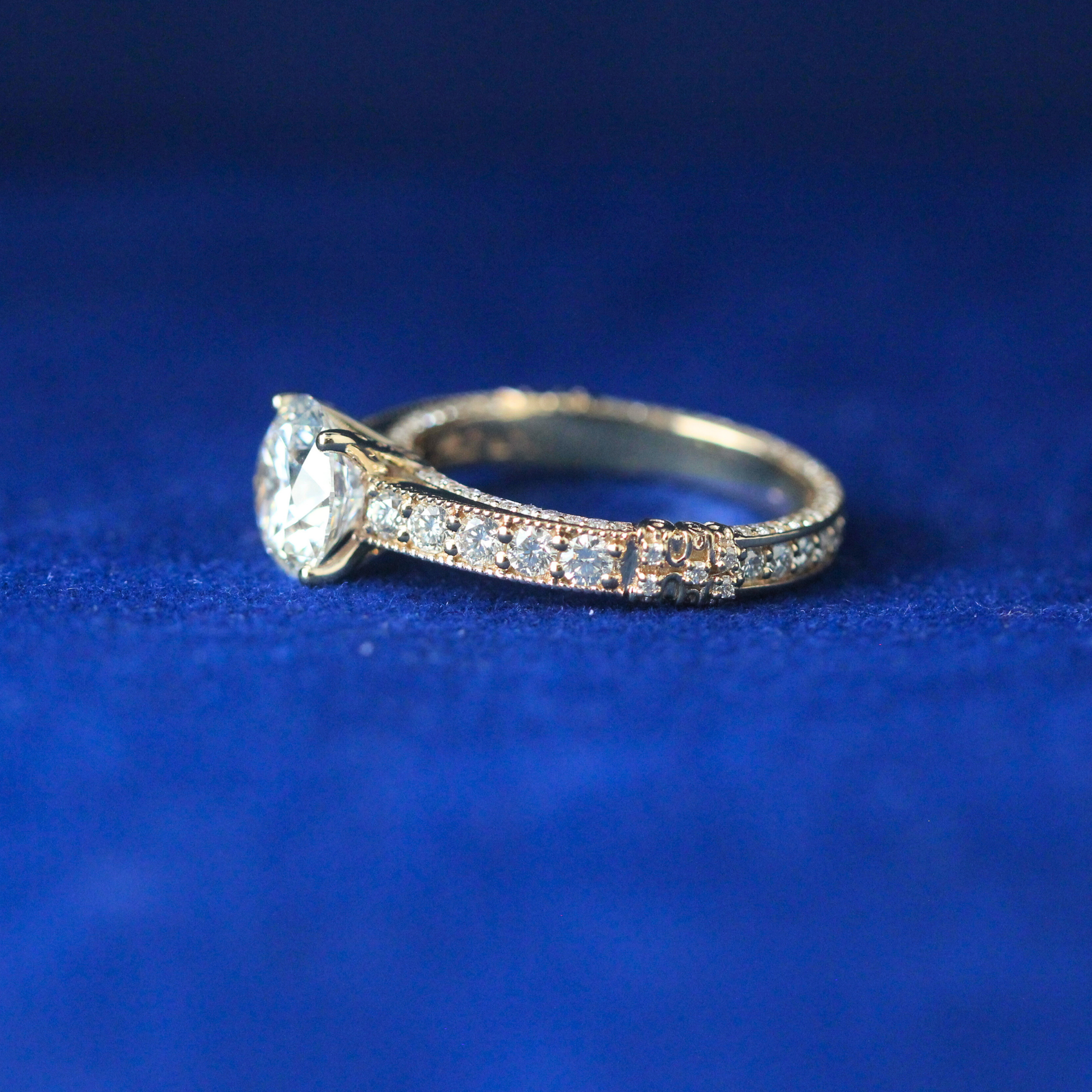 Right side angle of the Stellar Fusion moissanite diamond ring highlighting its radiant sparkle and luxurious design