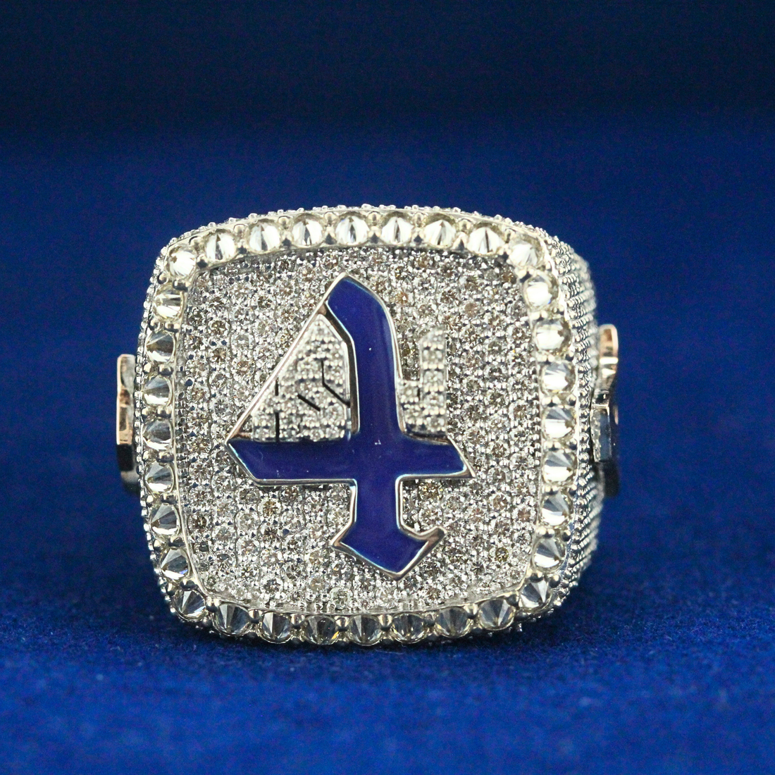 Right side angle of the Victory Four Elite Ring, highlighting detailed moissanite settings in a polished 925 silver finish, perfect for hip hop jewelry collectors.