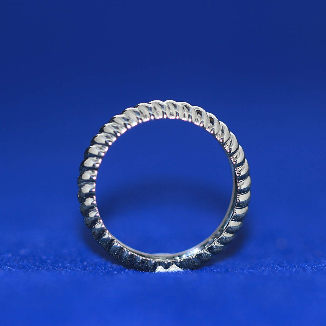 Front view of Infinity Silver Wedding Band in 14K silver with moissanite diamonds – elegant minimalist wedding ring for men and women, perfect with half iced out custom watch
