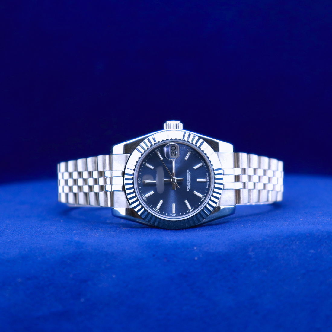 Front view of sleek light-blue dial half iced out custom watch featuring minimalist design and luxury appeal

